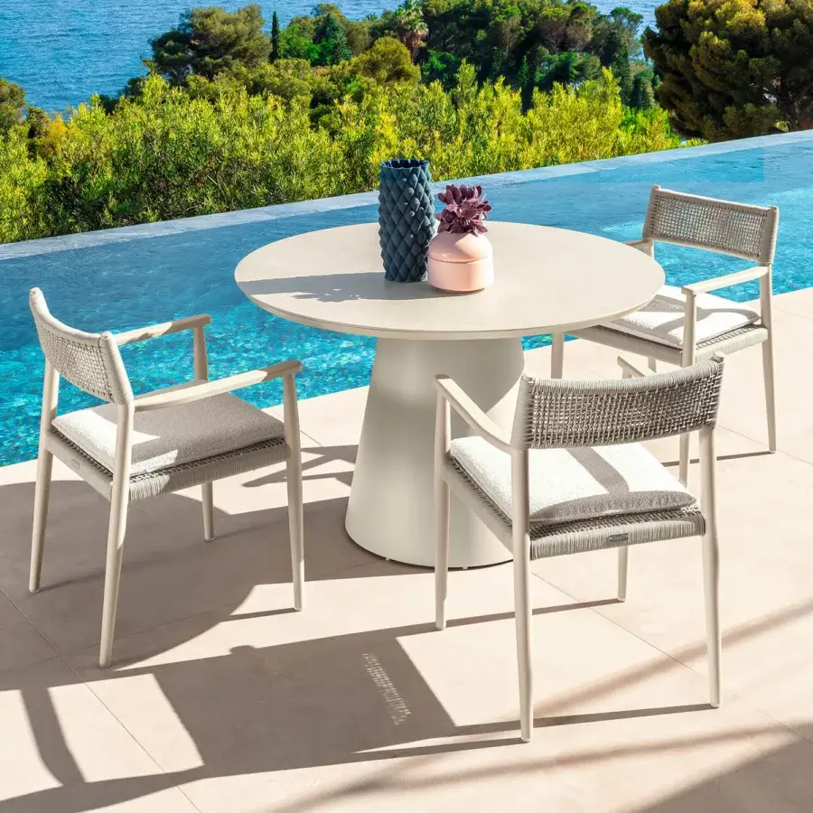 Distinguished Talenti Dolcevita Alu armchair with light beige aluminum frame and intricately woven backrest in white cushioning