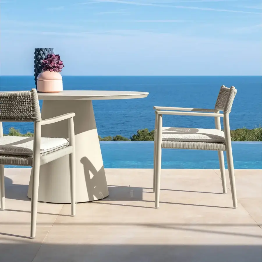 Elegant Talenti Dolcevita Alu armchair with light beige metal frame and woven textile backrest in white cushioning