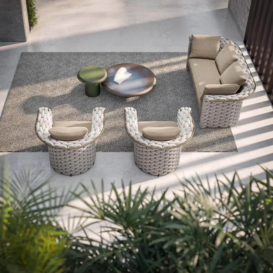 Elegant Rugiano Marina armchair with woven soft rope and plush fabric cushion in Outdoor Bronze finish