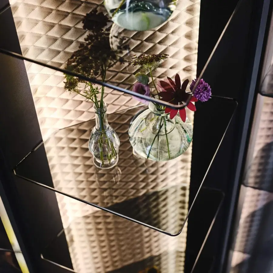 Distinguished Cattelan Italia Atelier showcase with transparent glass shelves and quilted matte interior built with a dark metal frame