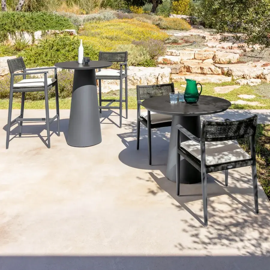 Superior Talenti Dolcevita Alu round table crafted with dark gray stoneware and sleek aluminum structure with matte finish