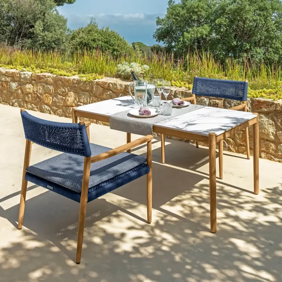 Superior Talenti Dolcevita Wood lounge chair with dark blue woven seat and matte light wood frame