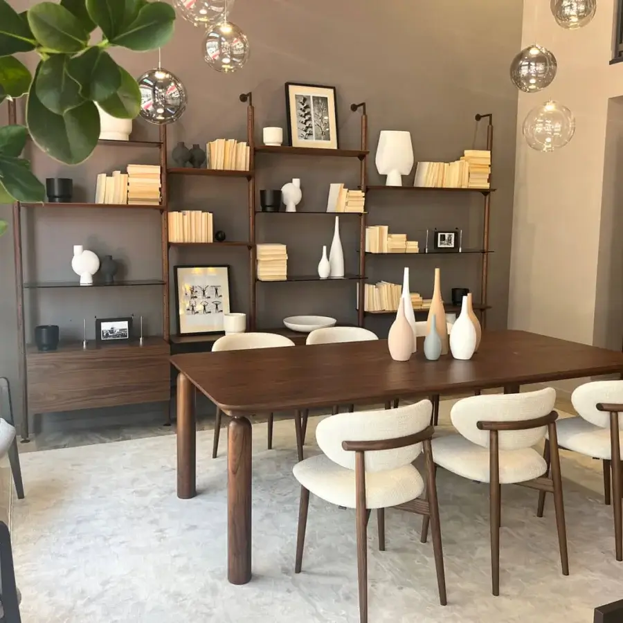 Distinguished Pacini & Cappellini Gio table with wooden construction and smooth matte dark brown finish showcasing wood grain