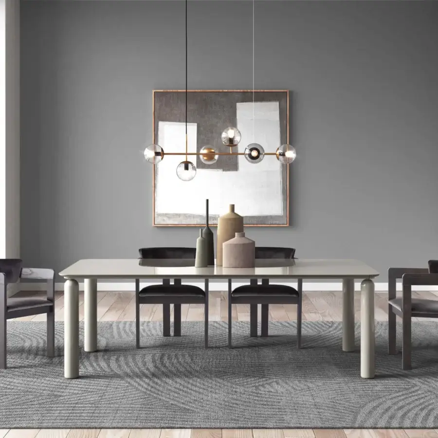 Distinguished Pacini & Cappellini Gio table with a wooden base and smooth light-colored wood top creating a clean aesthetic