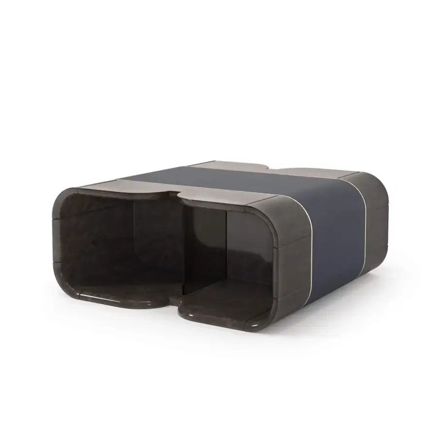 Distinguished Turri Madison coffee table with curved dark brown wood, light gold metal accents and a striking dark blue leather band