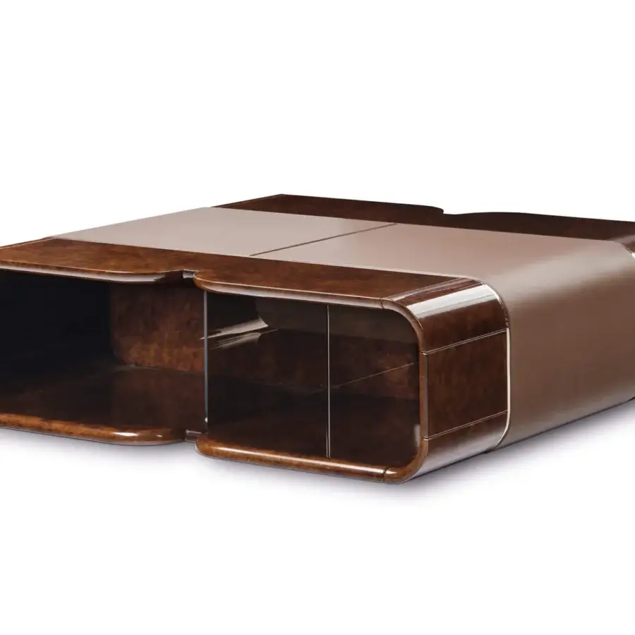 Elegant Turri Madison coffee table with curved wood, a leather band, glossy medium brown finish and light gold details