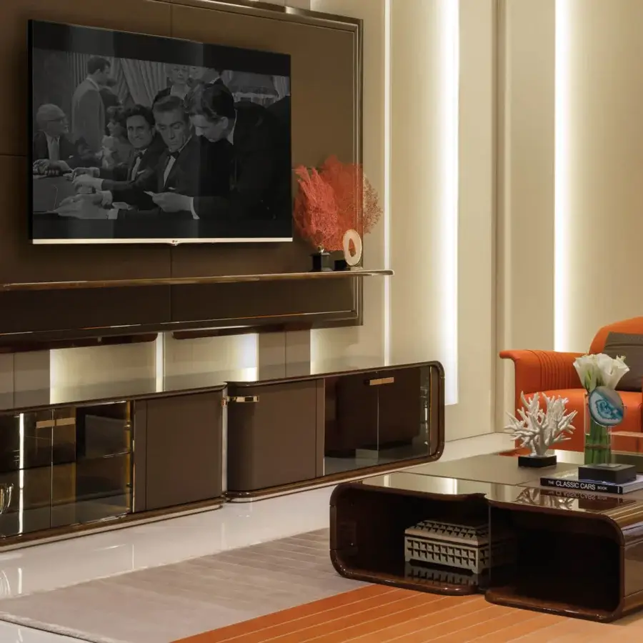 Superior Turri Madison coffee table crafted with curved wood, light gold details, glossy dark brown veneer, and a leather band