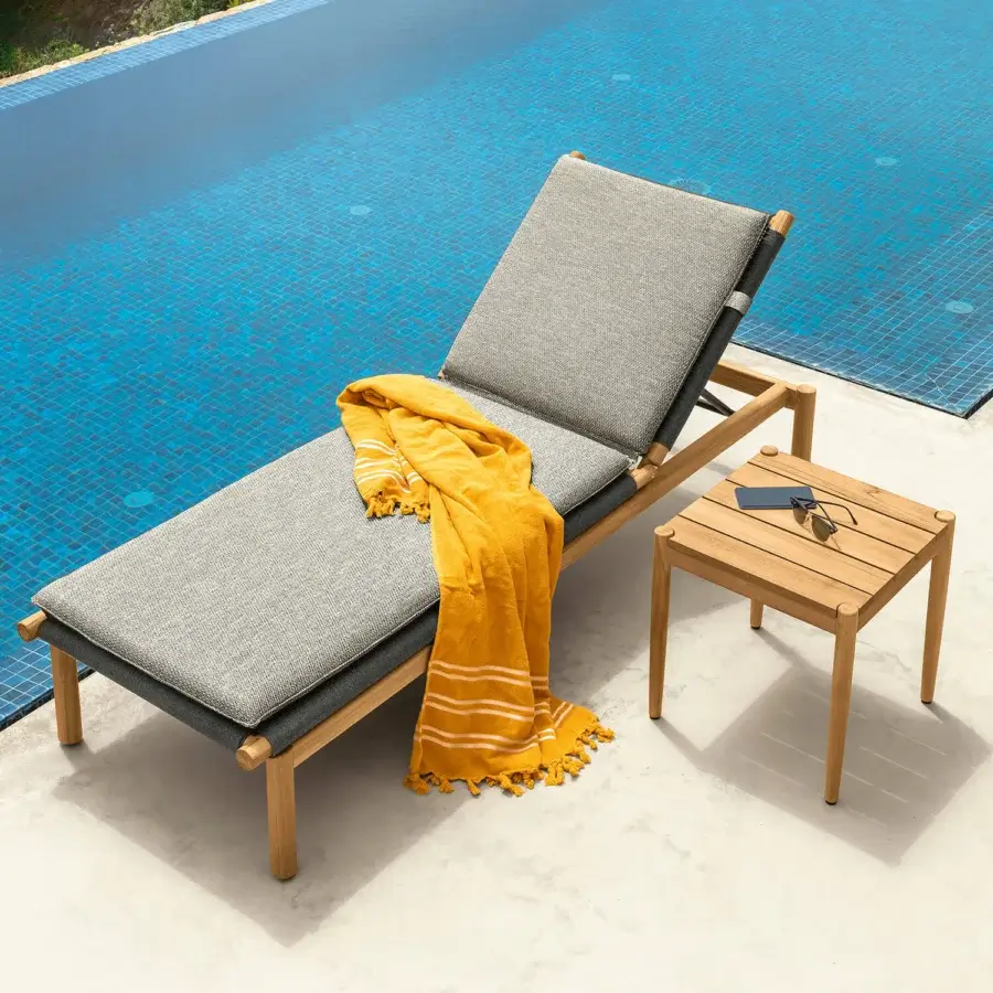 Sophisticated Talenti Dolcevita Wood lounger with textured grey textile upholstery and smooth wood frame
