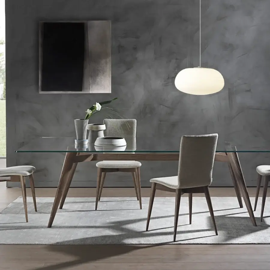 Elegant Pacini & Cappellini Novecento table with transparent tempered glass and solid ash structure in matte finish