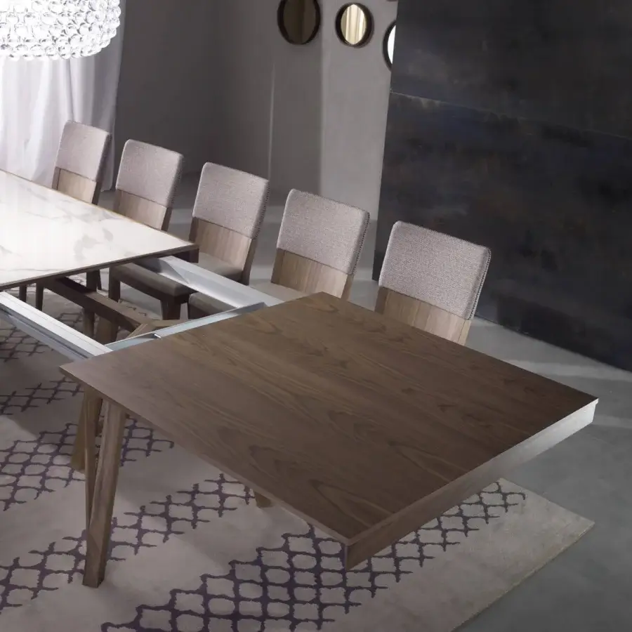 Elegant Pacini & Cappellini Zeus extendable table with lighter-toned top and solid Canaletto walnut base crafted in Italy