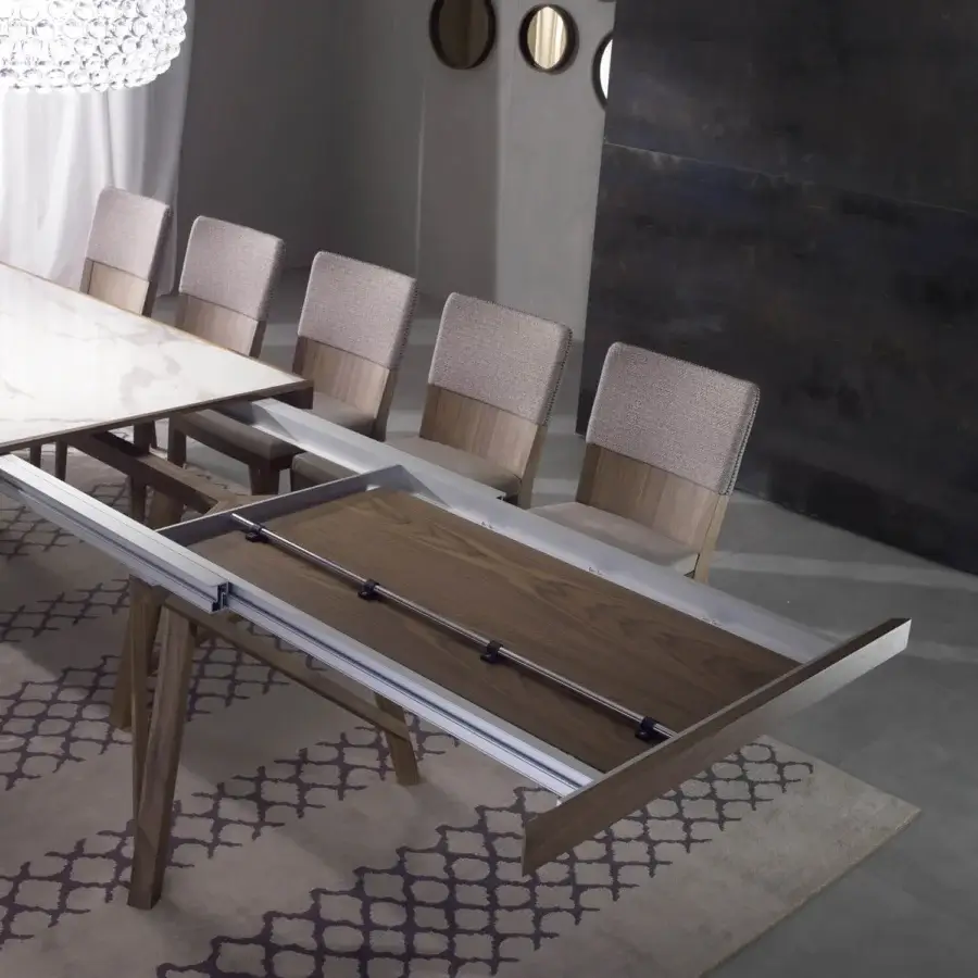 Exceptional Pacini & Cappellini Zeus extendable table with wood-look frame and light Laminam® top in marble pattern