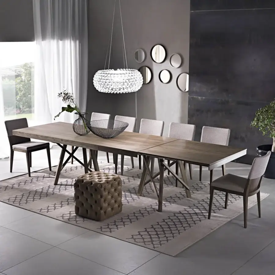 Distinctive Pacini & Cappellini Zeus extendable table with light brown matte finish and solid ash trestle base construction