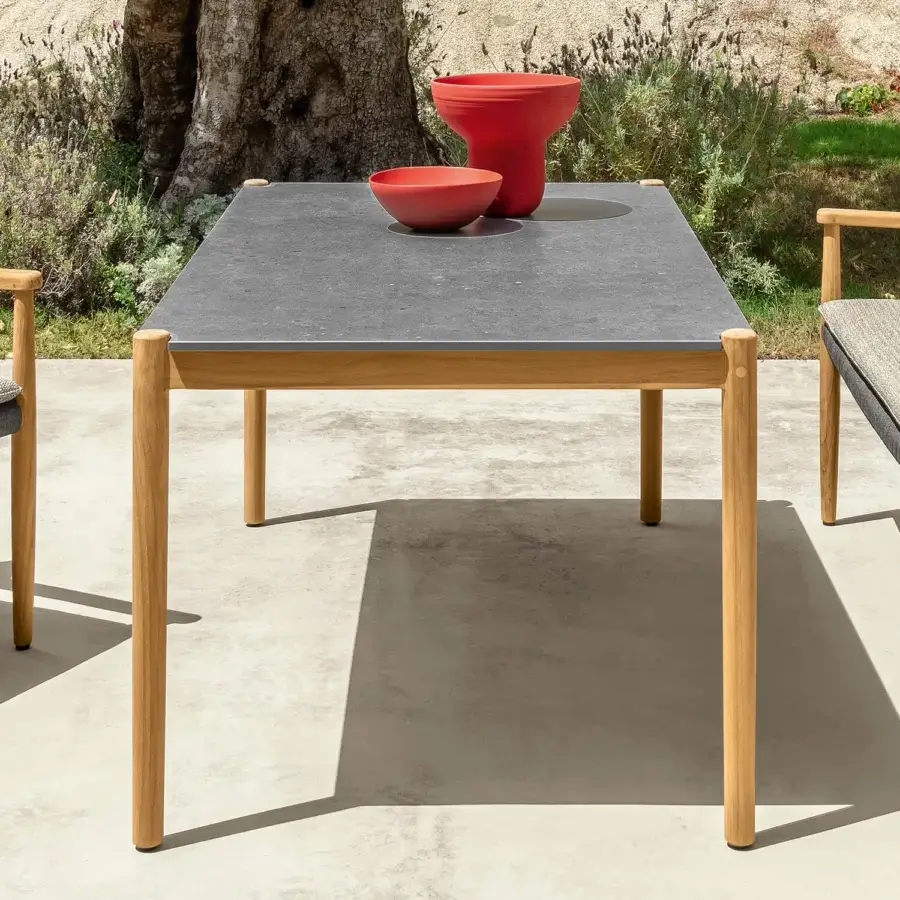 Distinguished Talenti Dolcevita Wood table with dark gray stoneware surface and satin natural teak frame