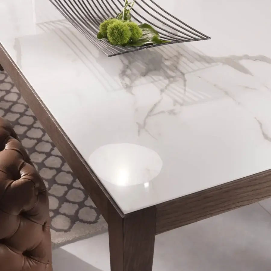 Distinguished Pacini & Cappellini Dominique table with thin Laminam® top and solid ash wood in dark brown glossy finish