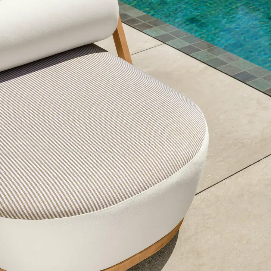 Superior Talenti Nami lounger with striped white and beige cushion, solid white base, and light-toned teak wood trim