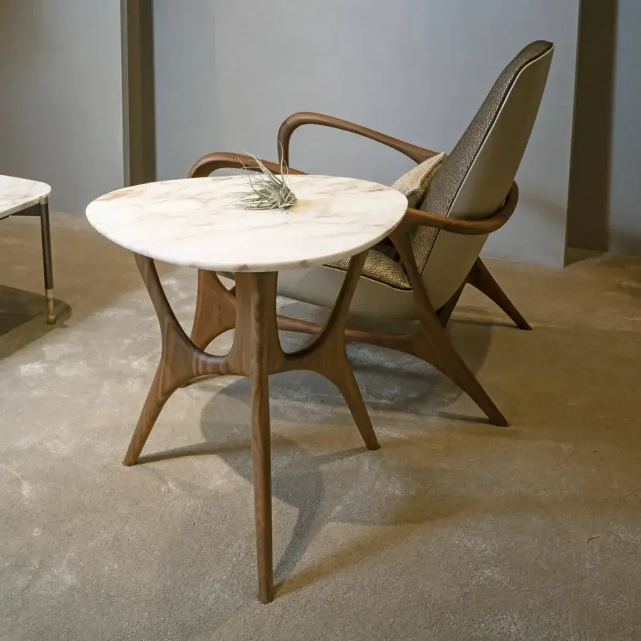 Sophisticated BelMondo by Bellotti Ezio Dedalo side table with curved wood base and round marble top in white coloring with light brown veining