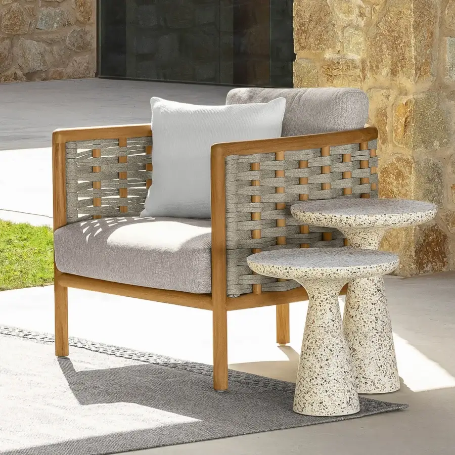 Elegant Talenti Prichi lounge chair with light brown teak frame and sophisticated gray woven rope backrest