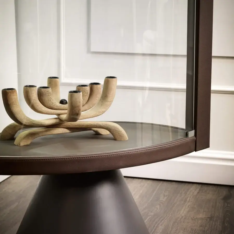 Exceptional Cattelan Italia Saba swiveling showcase with dark brown leather and extra-clear crystal shelves offers 360-degree viewing through curved glass