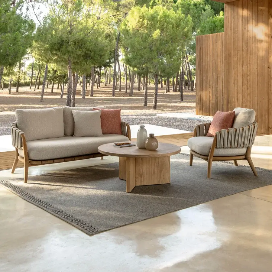 Distinguished Talenti Venice love seat sofa with solid wooden structure and reddish-orange cushions in beige textured rope wrapping
