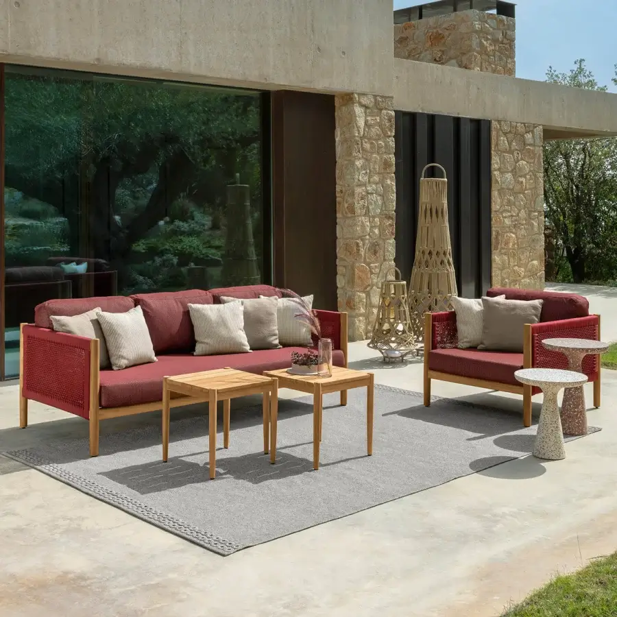 Sophisticated Talenti Dolcevita Wood lounge chair with woven red strings and reddish cushions crafted in Italy