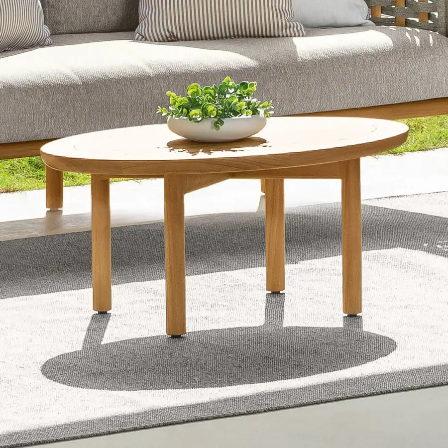 Exceptional Talenti Prichi coffee table crafted in teak with a smooth matte finish and contemporary curved lines