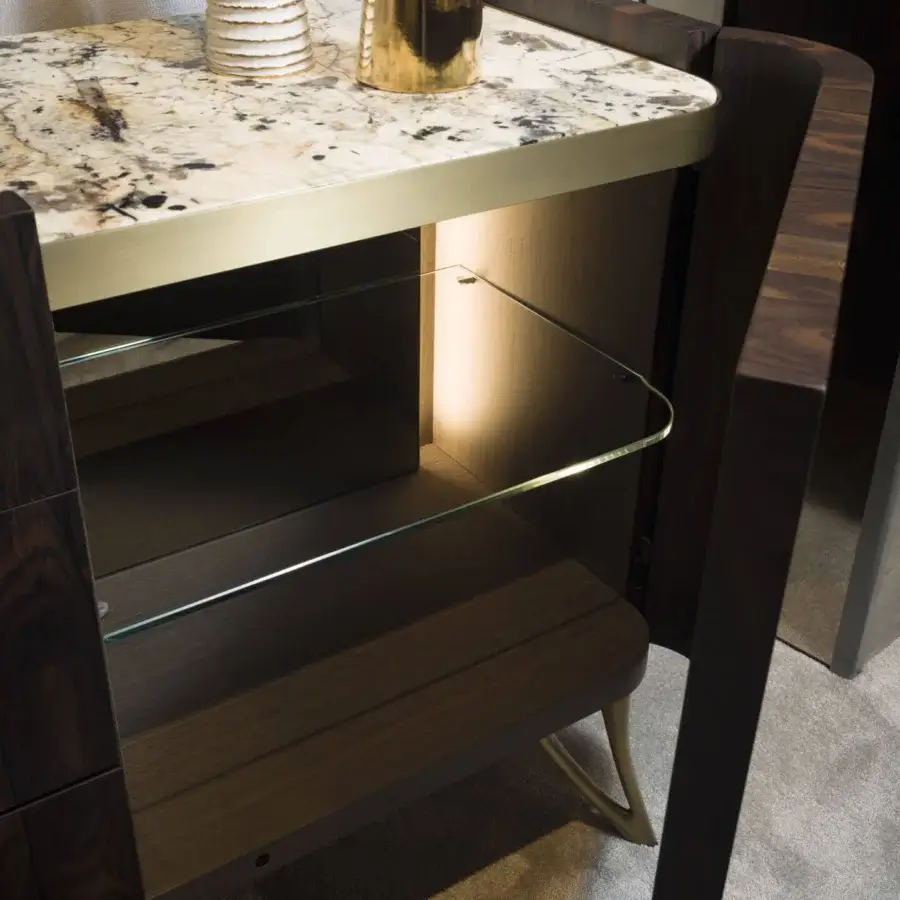 Harmonious BelMondo by Bellotti Ezio Atena sideboard with light wood, dark doors and mottled stone, crafted with brassy metal handles and feet