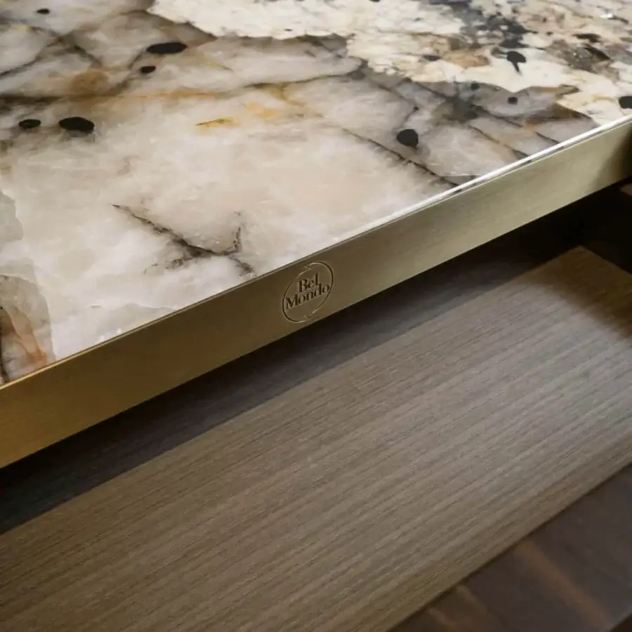 Distinguished BelMondo by Bellotti Ezio Atena sideboard crafted in medium-brown wood with a swirling composite countertop framed in brassy metal
