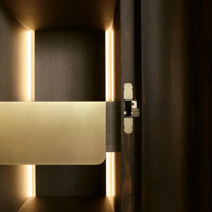 Distinguished BelMondo by Bellotti Ezio Zeus bar cabinet with deep brown wood and illuminated golden accents