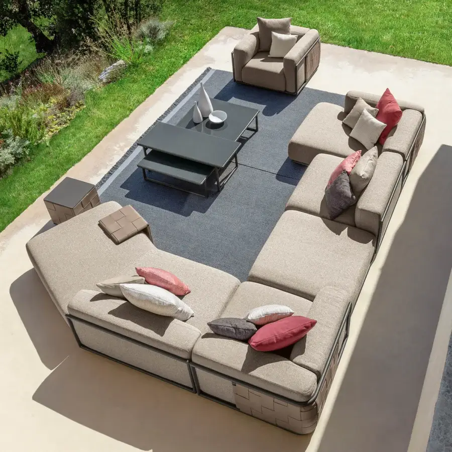 Exceptional Talenti Tressé sectional with tubular aluminum woven in hand-made eco-leather bands and imposing cushions in red, gray, beige hues