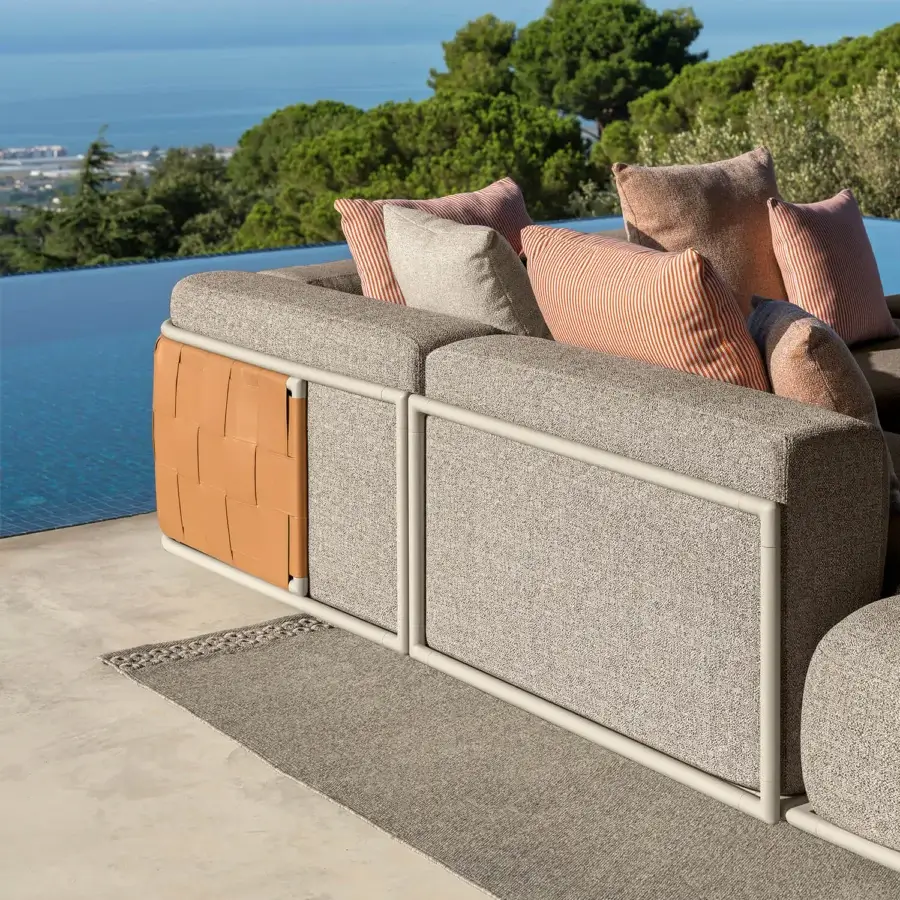 Exceptional Talenti Tressé sectional with tan eco-leather weaving, speckled gray cushions and reddish-orange accents in a matte finish