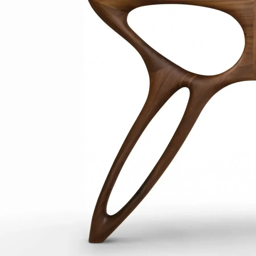 Elegant BelMondo by Bellotti Ezio Prometeo table crafted in wood with smooth medium-toned brown finish and curved lines