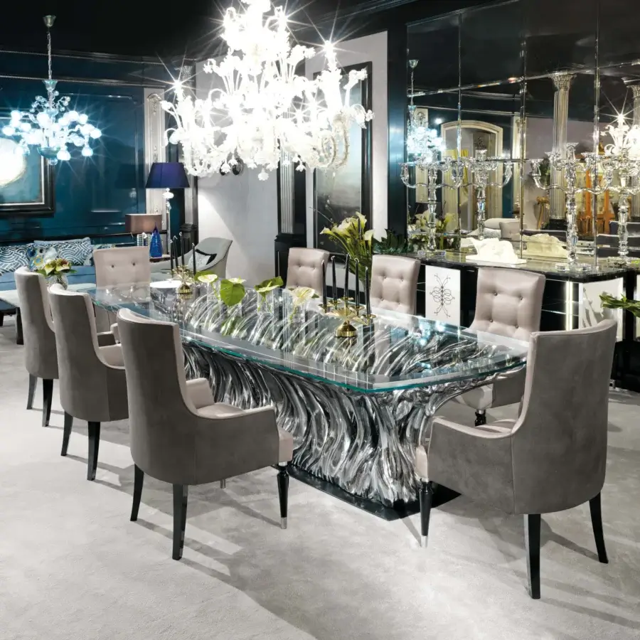 Distinguished BelMondo by Bellotti Ezio Ficus table exhibits intertwined sculptural elements with glossy reflective sheen and clear glass top