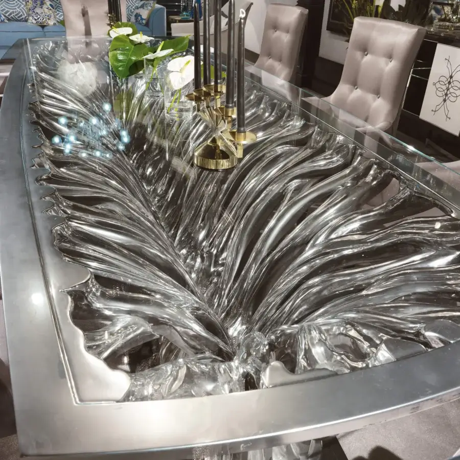 Exceptional BelMondo by Bellotti Ezio Ficus table exhibits sculptural woodwork with a clear glass top and silver-toned finish