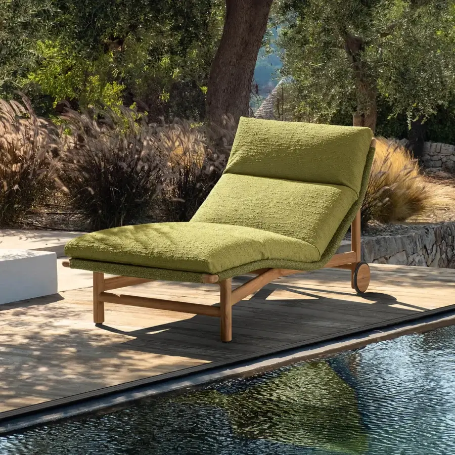 Distinguished Talenti Jun lounger with muted green bouclé fabric and warm wooden structure crafted in Italy