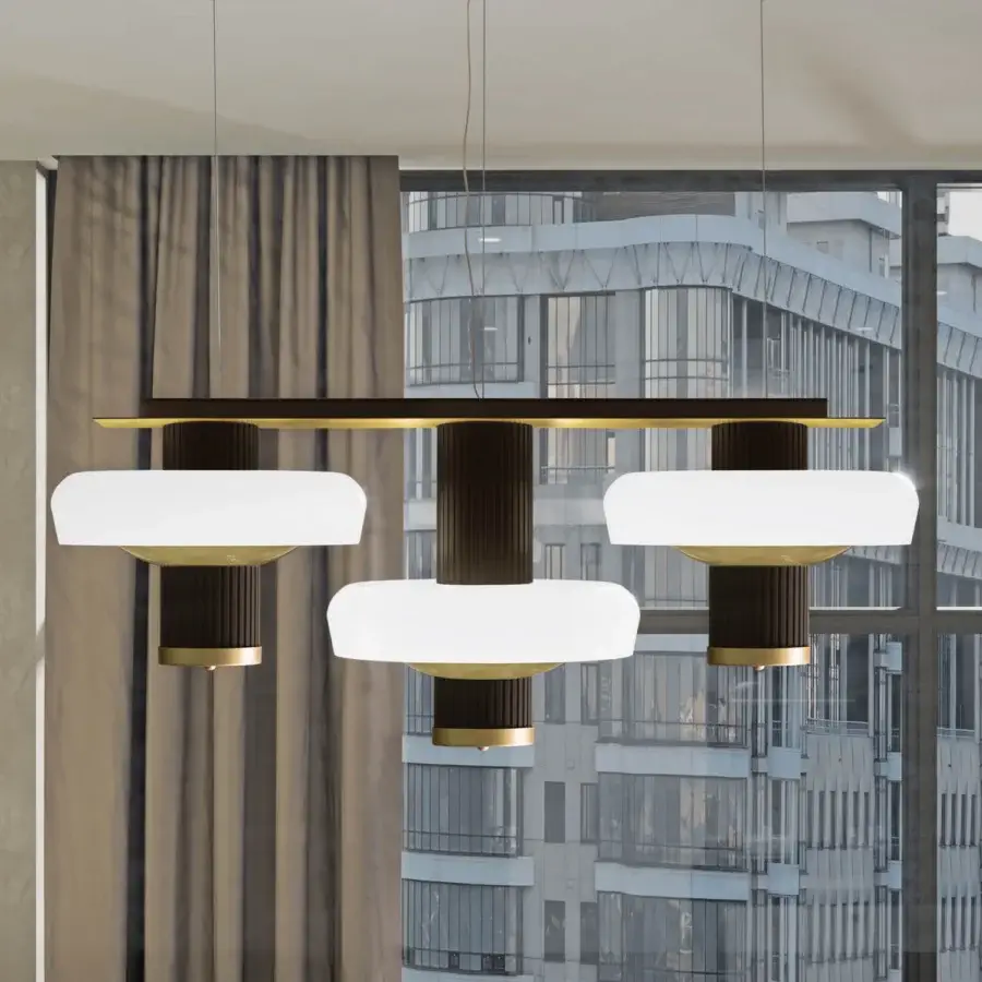 Exceptional Turri Claire suspension lamp with dark brown grooved metal columns and bronze white glass discs creating warm diffused light
