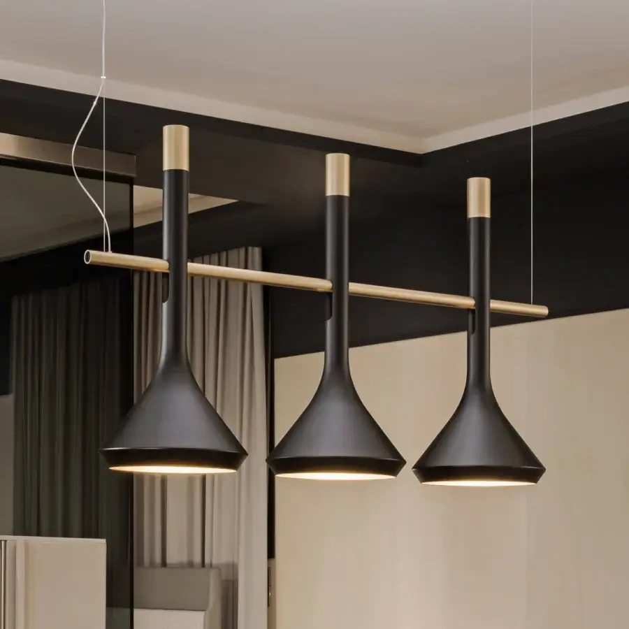Distinguished Turri Tubular Bells suspension lamp with three black metal shades and a golden horizontal bar