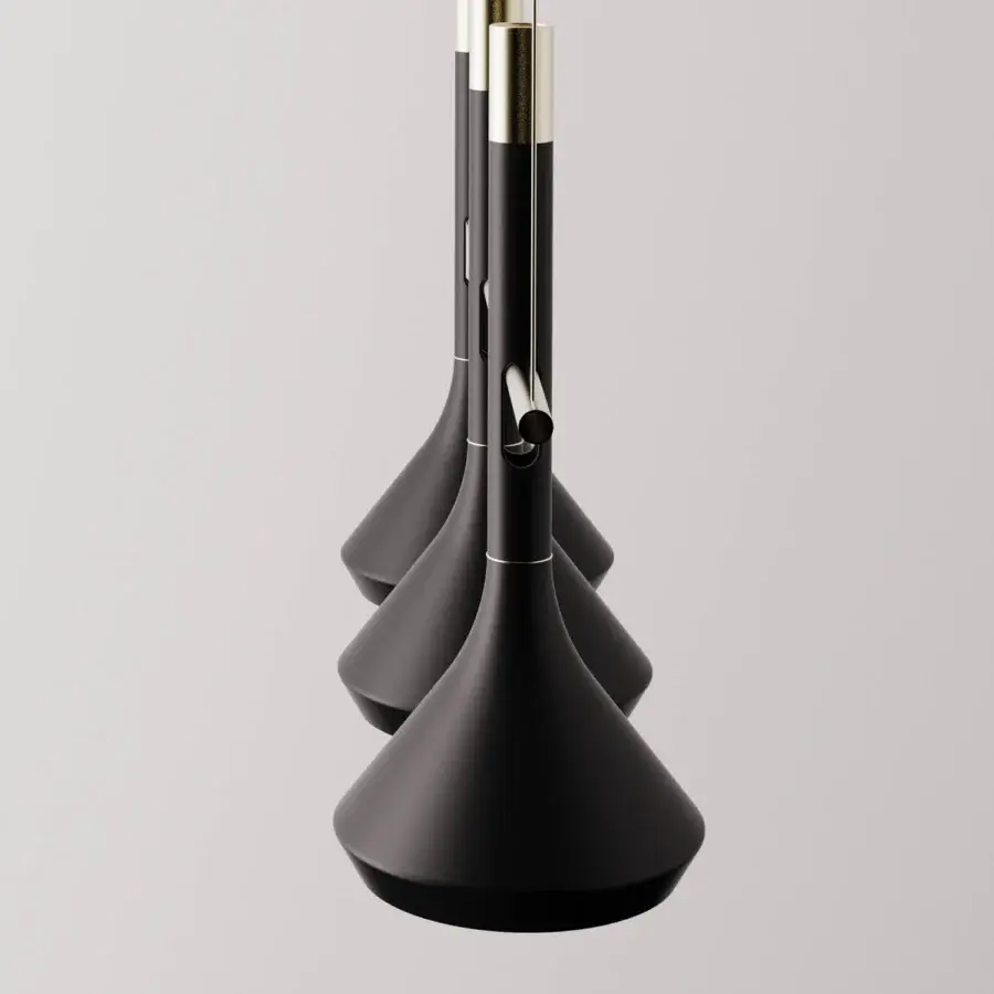 Elegant Turri Tubular Bells suspension lamp with conical black metal shades and gold accents in a matte finish