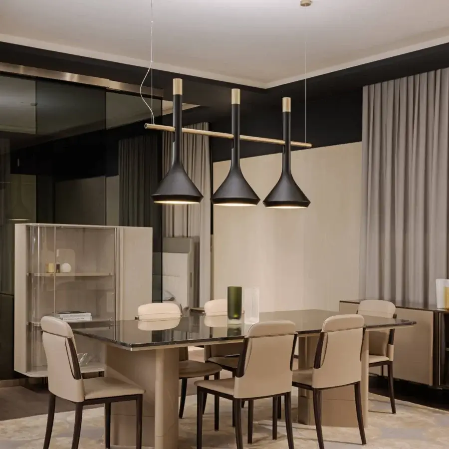 Elegant Turri Tubular Bells suspension lamp with matte black metal conical shades and gold interior finish