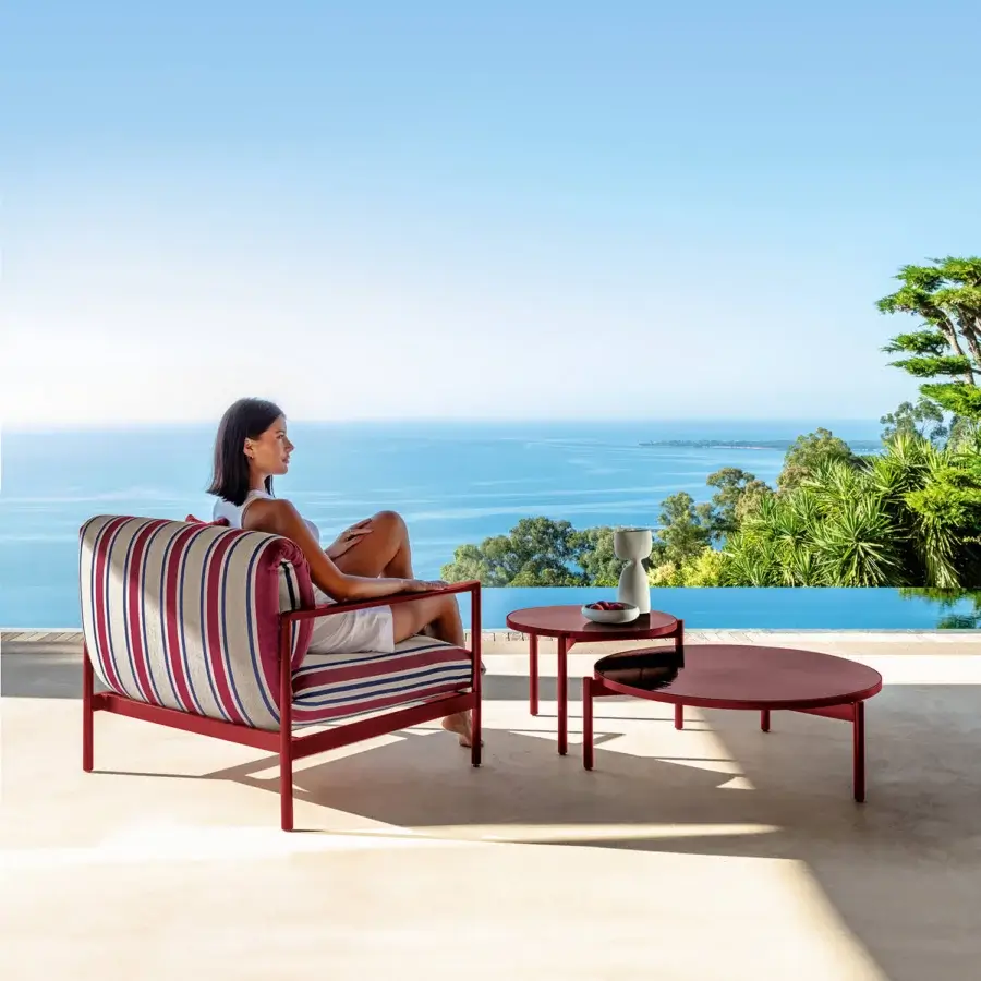 Sophisticated Talenti Nalu lounge chair with painted aluminum frame and red, white, blue striped fabric cushions crafted in Italy
