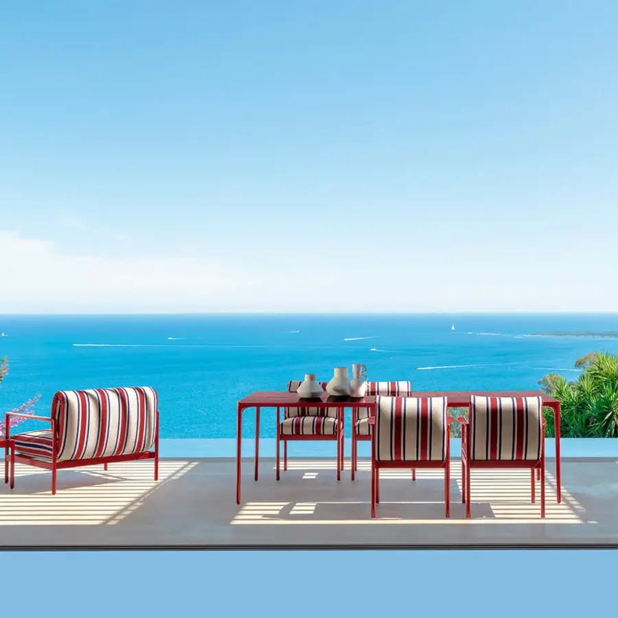 Exceptional Talenti Nalu lounge chair with red painted aluminum and beige, white striped fabric upholstery in matte finish
