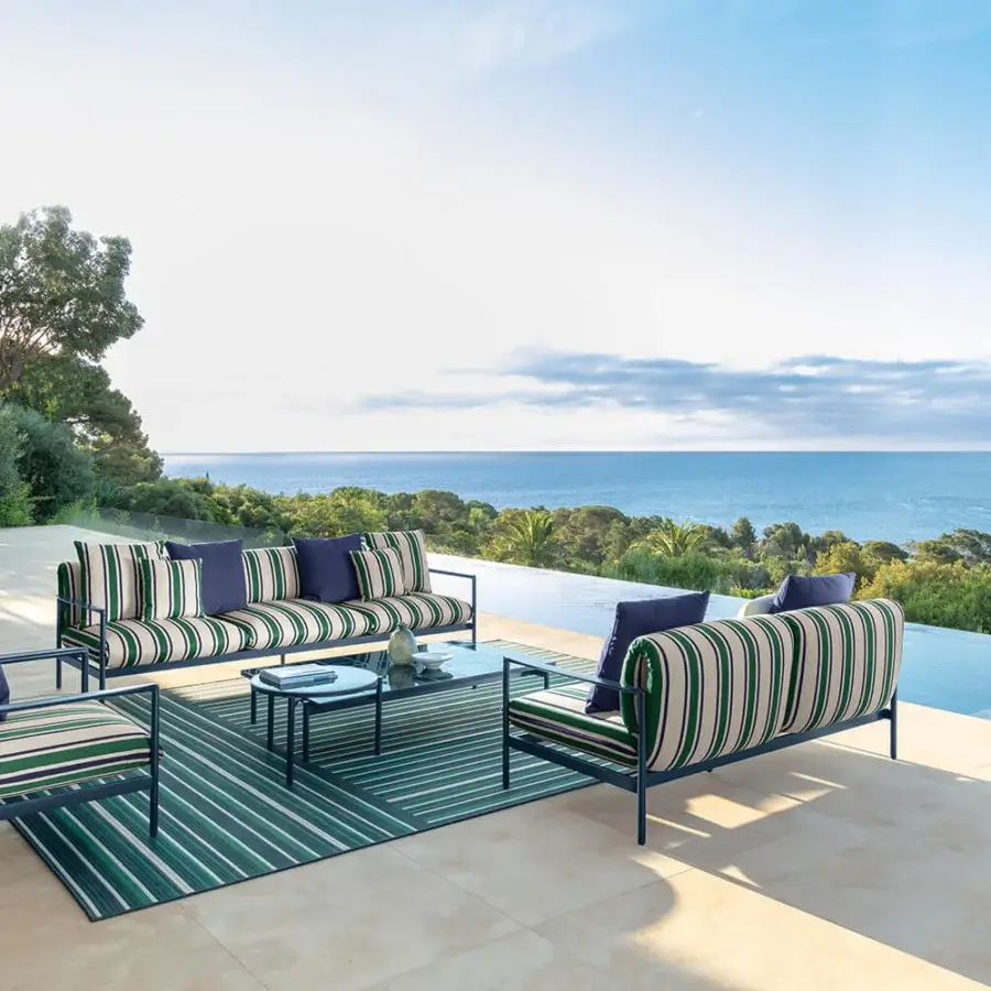 Captivating Talenti Nalu lounge chair with green and white striped fabric over dark blue painted aluminum including a textile cushion