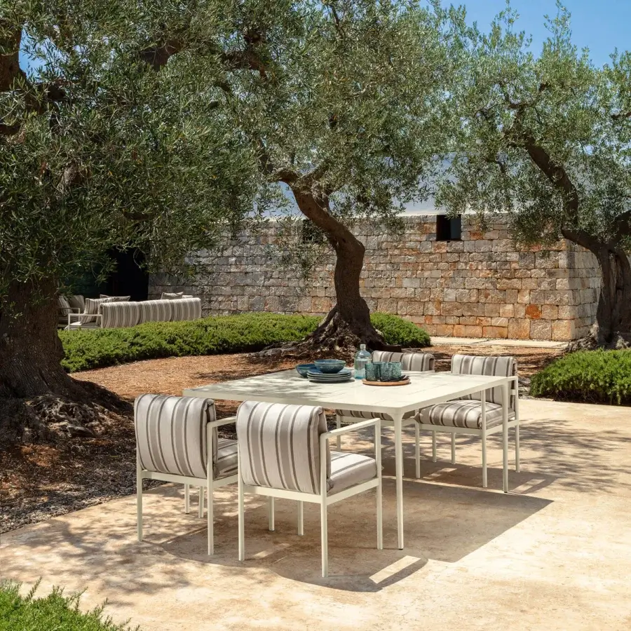 Distinguished Talenti Nalu armchair with striped cushions in beige and gray tones and semi-polished aluminum frame