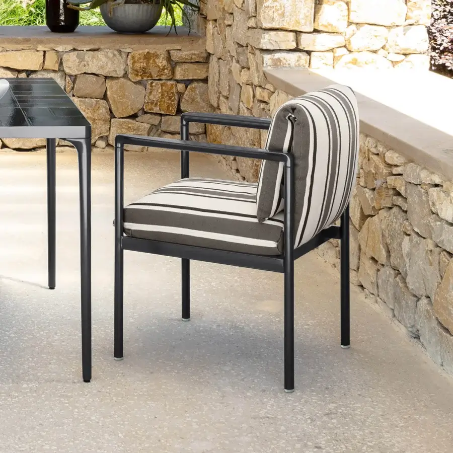 Distinguished Talenti Nalu armchair with a sinuous aluminum structure and striped gray, white, black cushion crafted in Italy