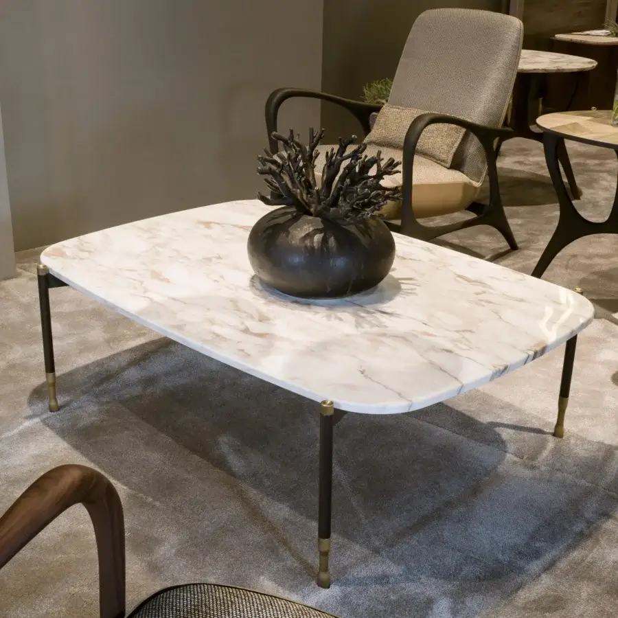 Distinguished BelMondo by Bellotti Ezio Patagonia coffee table with beige and white veined marble top and dark metal legs crafted with brass details
