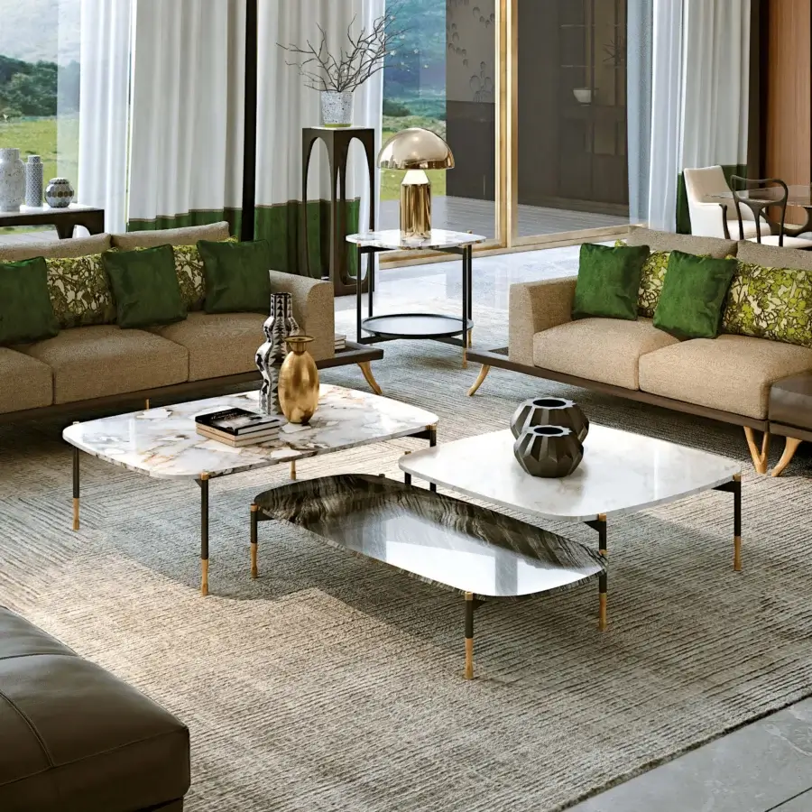 Distinguished BelMondo Patagonia coffee table with glossy marble tabletop and dark metal legs featuring gold accents