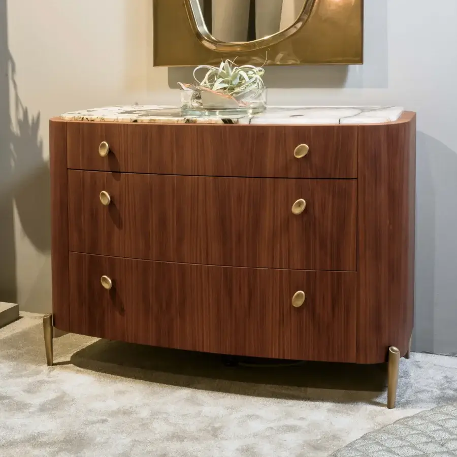 Distinguished BelMondo by Bellotti Ezio Lapeto dresser in medium brown wood with light stone top and golden knobs