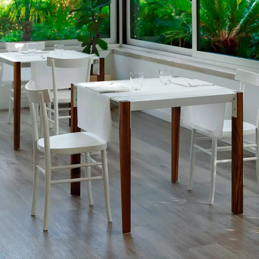 Elegant Casamania Cherish chair crafted in durable synthetic material with smooth matte white finish and subtly curved form
