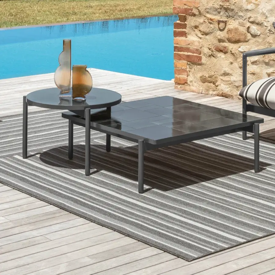 Exceptional Talenti Nalu coffee table with dark gray glazed stoneware and aluminum structure exhibiting geometric design