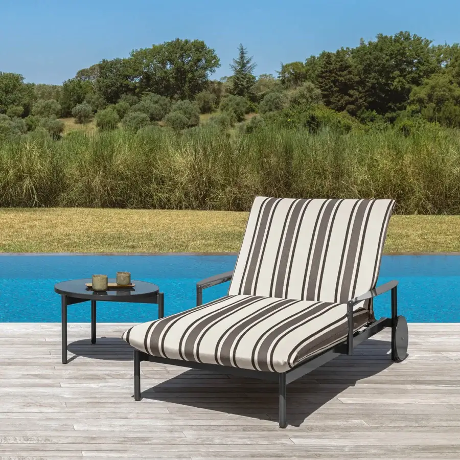 Distinguished Talenti Nalu coffee table with sleek circular form crafted in glazed stoneware and durable aluminum with matte finish