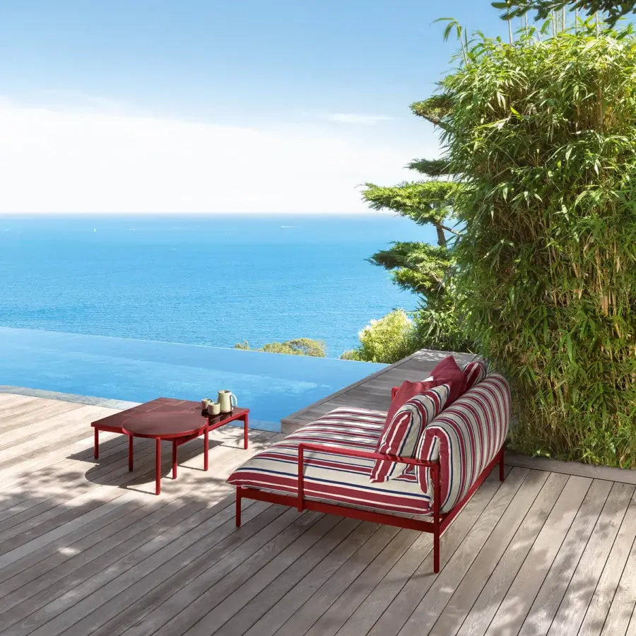 Distinguished Talenti Nalu coffee table crafted in red glazed stoneware with sleek aluminum and a matte finish